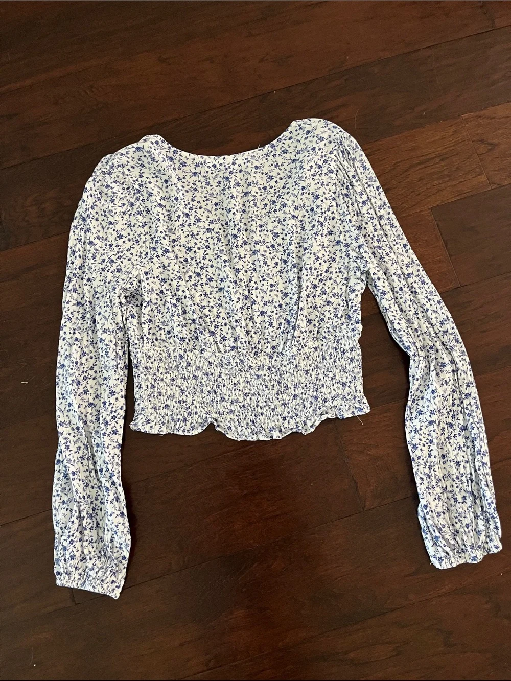 Astr Floral Long-Sleeve Smocked Crop Top in White and Blue